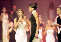 Lisa Tollet reacts to winning Miss Tennessee USA 2001.  First runner-up Candice Sanders later won Miss CA USA 2003.