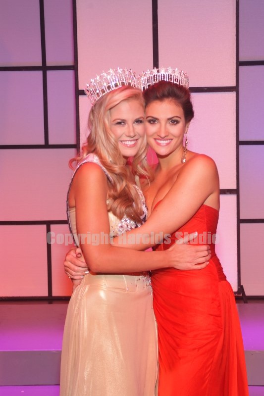 Brenna Mader hugs 2012 titleholder Jessica Hibler after winning Miss Tennessee USA 2013
